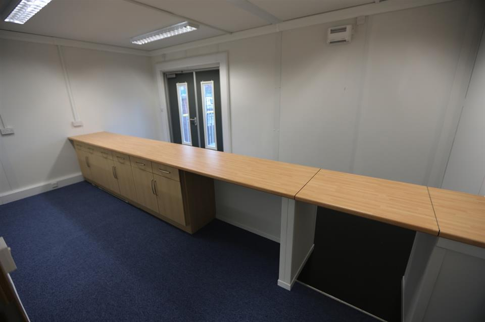 long bench going inside the new office at George Roberts